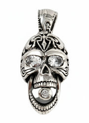 A front view of the sterling silver tribal diamond skull pendant, showing the four clear CZ stones.