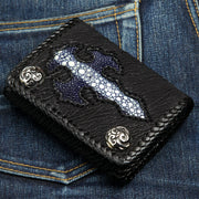 A black leather biker wallet with a braided edge and a large gothic cross inlay made from blue and white stingray leather.