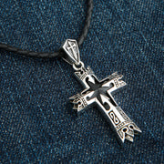 An angled view of the men's gothic knight cross pendant with a black onyx, showcasing its 3D design.